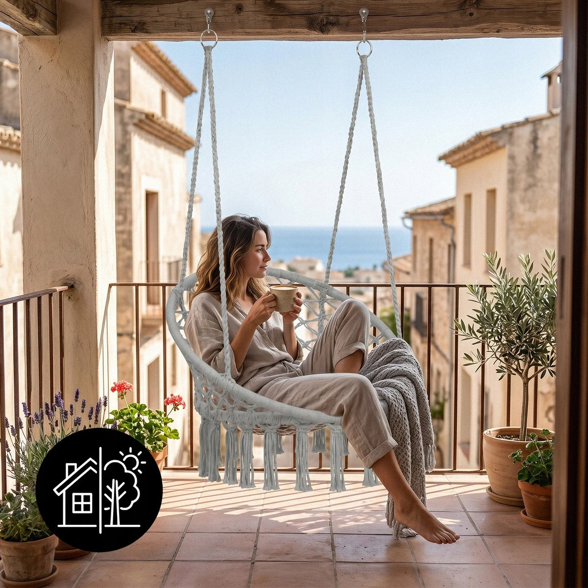 Poltrona sospesa intrecciata Boho a nido