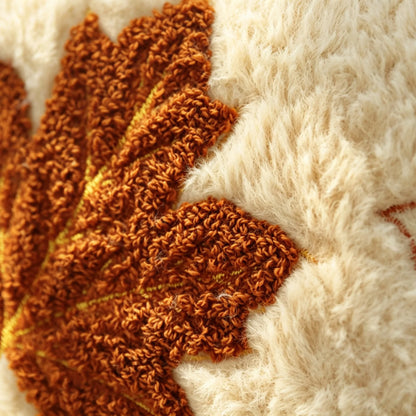 Copricuscino in peluche beige con zucca ricamata